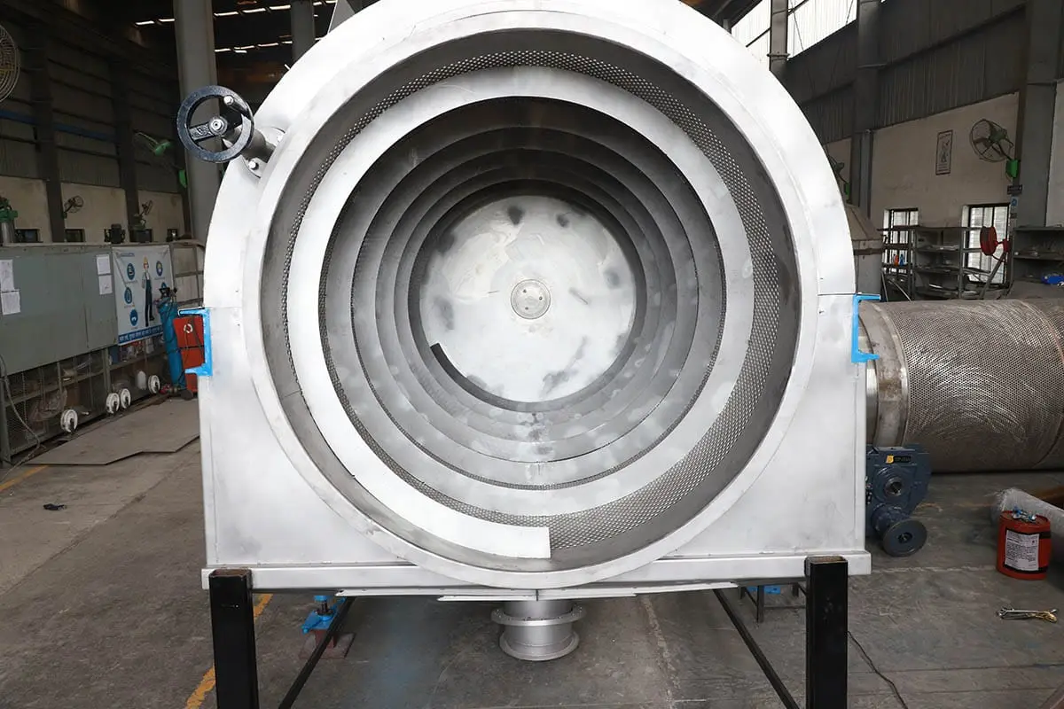 Parason inclined trommel screen — live installation showing perforated drum interior